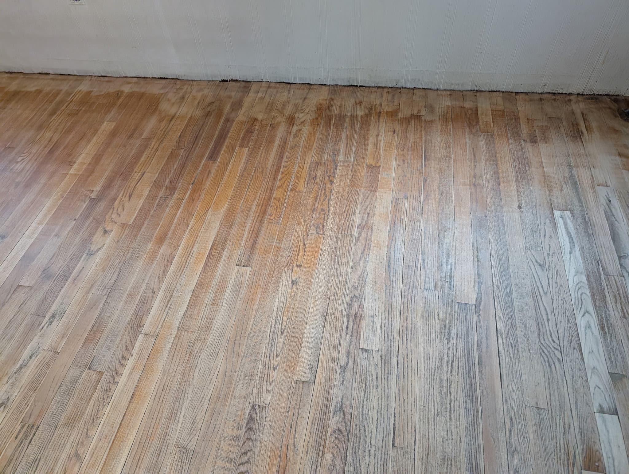 Sanded and refinished oak hardwood flooring